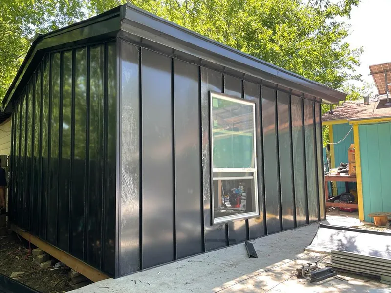 Black standing seam metal wall panels for Roof Inspection in Ashburnham