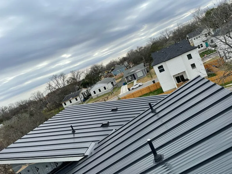 Standing seam metal roof panels with vents for Skylight Repair in Ashburnham
